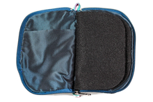 Load image into Gallery viewer, Interior view of jewelry/sewing case showing midnight blue lining and pockets, and black felt pages.
