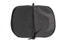 Load image into Gallery viewer, Interior view of black jewelry/sewing case featuring pockets and felt pages.