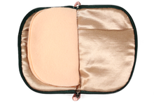 Load image into Gallery viewer, Front view of bright pink floral linen jewelry case with a dark green zipper and two small light pink loops, one situated at the top and one at the bottom.