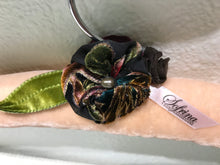 Load image into Gallery viewer, Zoom in view of Blush Velvet Padded Hanger showing off the peacock burnout velvet flower and green velvet leaf.