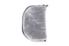Load image into Gallery viewer, Back of grey velvet jewelry/sewing case with dark blue zipper and two small green loops one situated at the top and one at the bottom.
