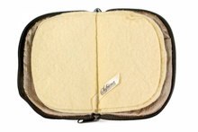 Load image into Gallery viewer, Interior view of jewelry/sewing case showing a gold lining and cream colored felt pages.
