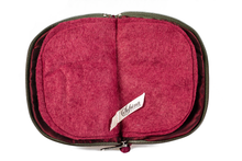 Load image into Gallery viewer, Interior view of jewelry/sewing case showing burgundy lining, pockets, and felt pages.
