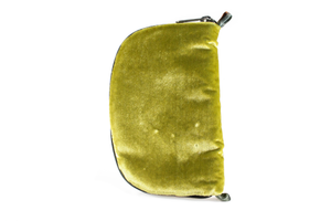 Back view of olive green velvet jewelry/sewing case with a dark green zipper and two green and brown loops, one situated at the top and one at the bottom.