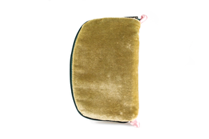 Front view of sage green velvet jewelry/sewing case with a dark green zipper and two light pink loops, one situated at the top and one at the bottom.