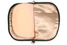 Load image into Gallery viewer, Front view of bright pink floral linen jewelry case with a dark green zipper and two small light pink loops, one situated at the top and one at the bottom.
